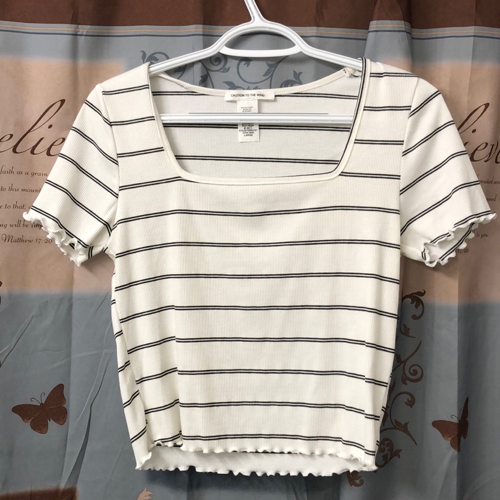 Half length casual shirt.